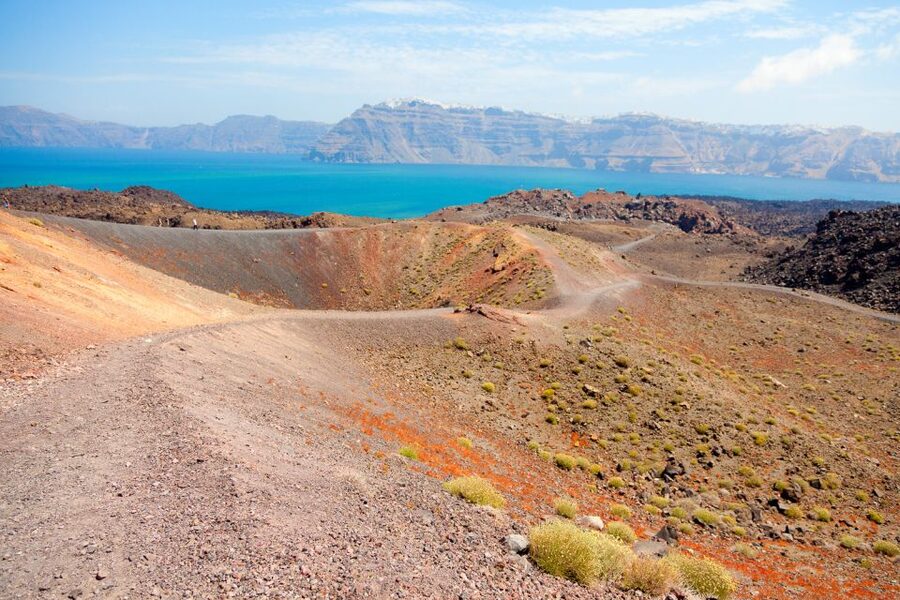 Santorini: Volcano and Hot Springs Sunset Dinner Cruise - Greek dinner with wine as the sun drops