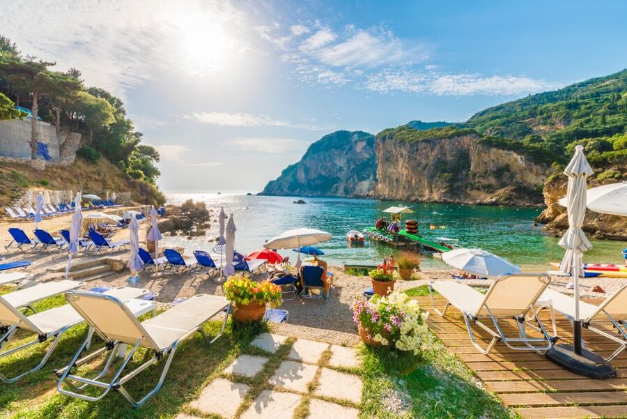 Saranda: Corfu Town and Palaiokastritsa Day Trip with Cruise - Palaiokastritsa beach, caves, and clear water