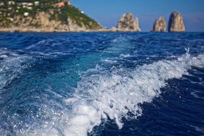 Small Group Capri Island Boat Ride with Swimming and Limoncello - Faraglioni rocks and the swimming stop