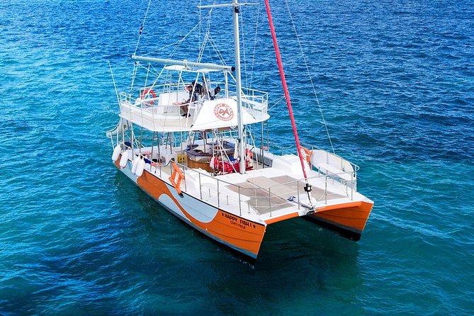 Small Group Snorkeling Cruise with Open Bar and Light Snacks - The slide, swimming, and the floating bar