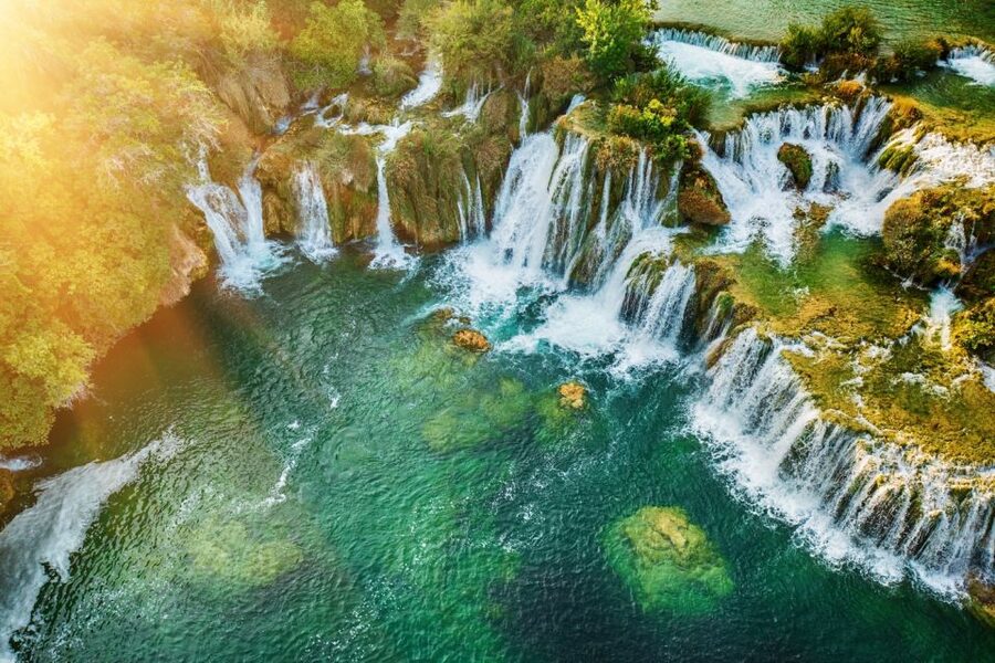 Split: Krka Waterfalls Trip with Boat Cruise and Swimming - Primošten: the beach reward at the end