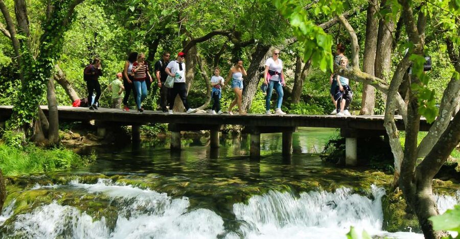 Split: Krka Waterfalls With Boat Cruise, Wine and Olive Oil - Old mills, stone houses, and Europe’s first hydroelectric station