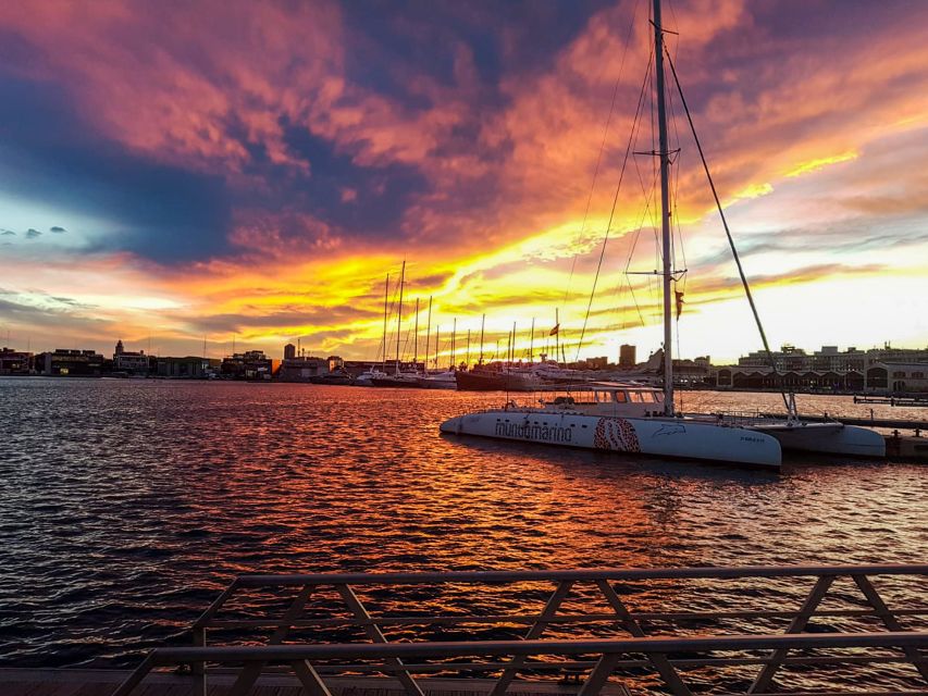 Valencia: Sailing Catamaran Cruise with Sunset Option and DJ - Drinks, snacks, and onboard costs