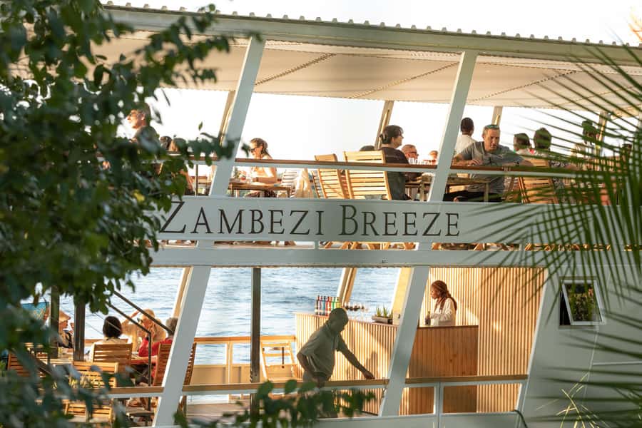 Victoria Falls: Dinner Cruise on the Zambezi River - Boarding the Zambezi Breeze and choosing your view