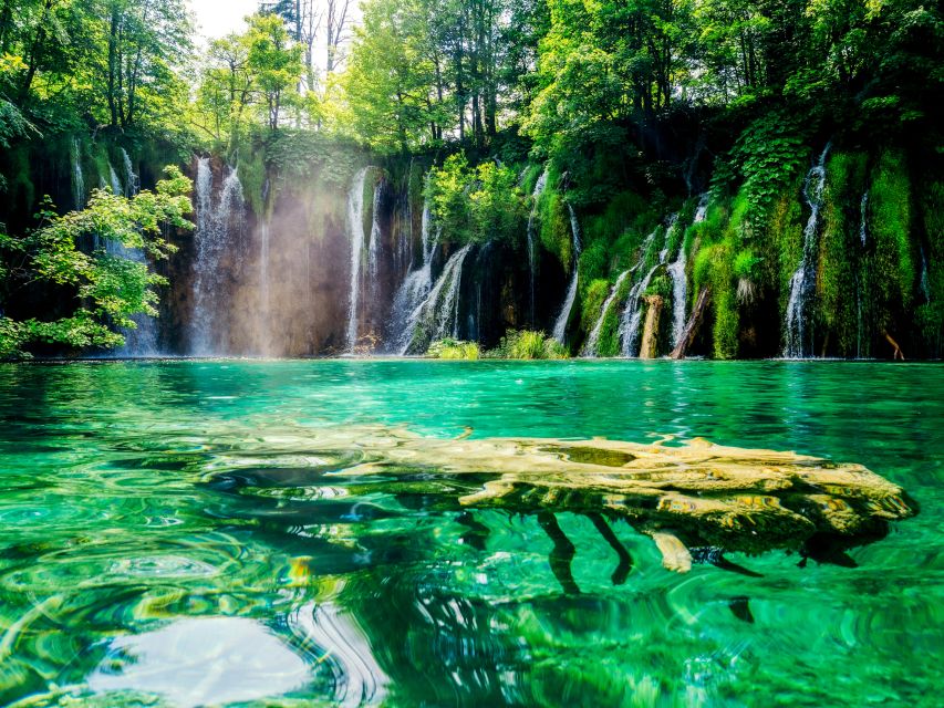 Zadar: Plitvice Lakes with Boat Ride and Zadar Old Town Tour - The electric train and the final views